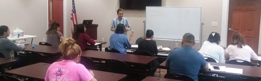 Manuel working with our English learners