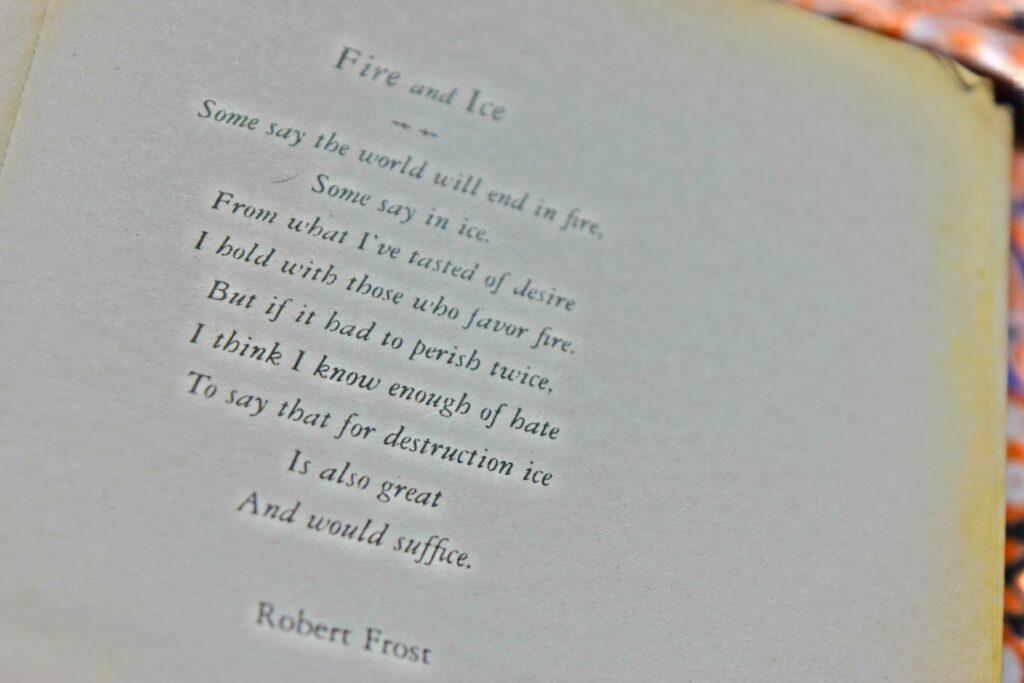 Blurred image of Fire and Ice poem by Robert Frost.