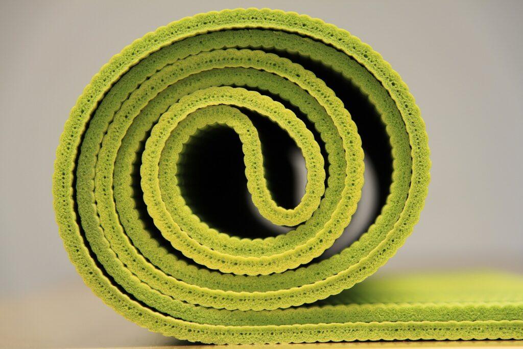 Bright green yoga mat.