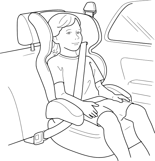 Child sitting comfortably in a car seat, wearing a seatbelt.